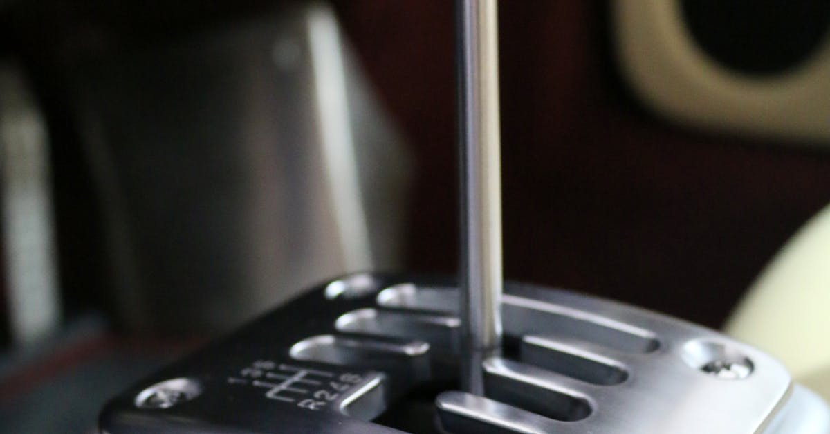 Selective Focus Photo of Gray Gear Shift Lever